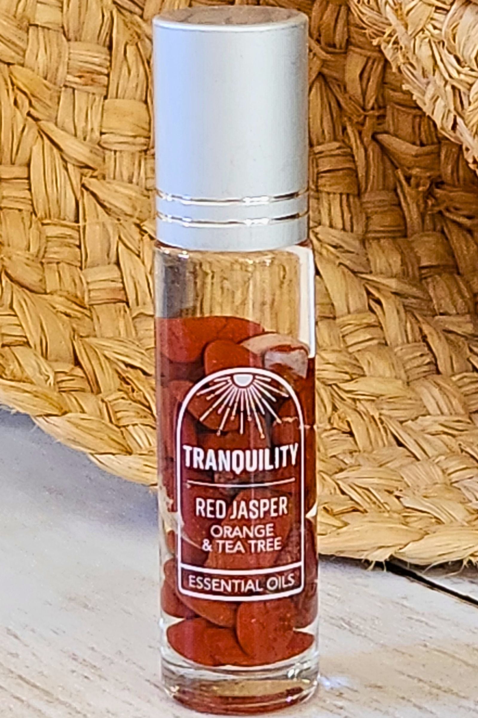 Tranquility: Red Jasper Crystal Orange & Tea Tree Roll-On Essential Oil