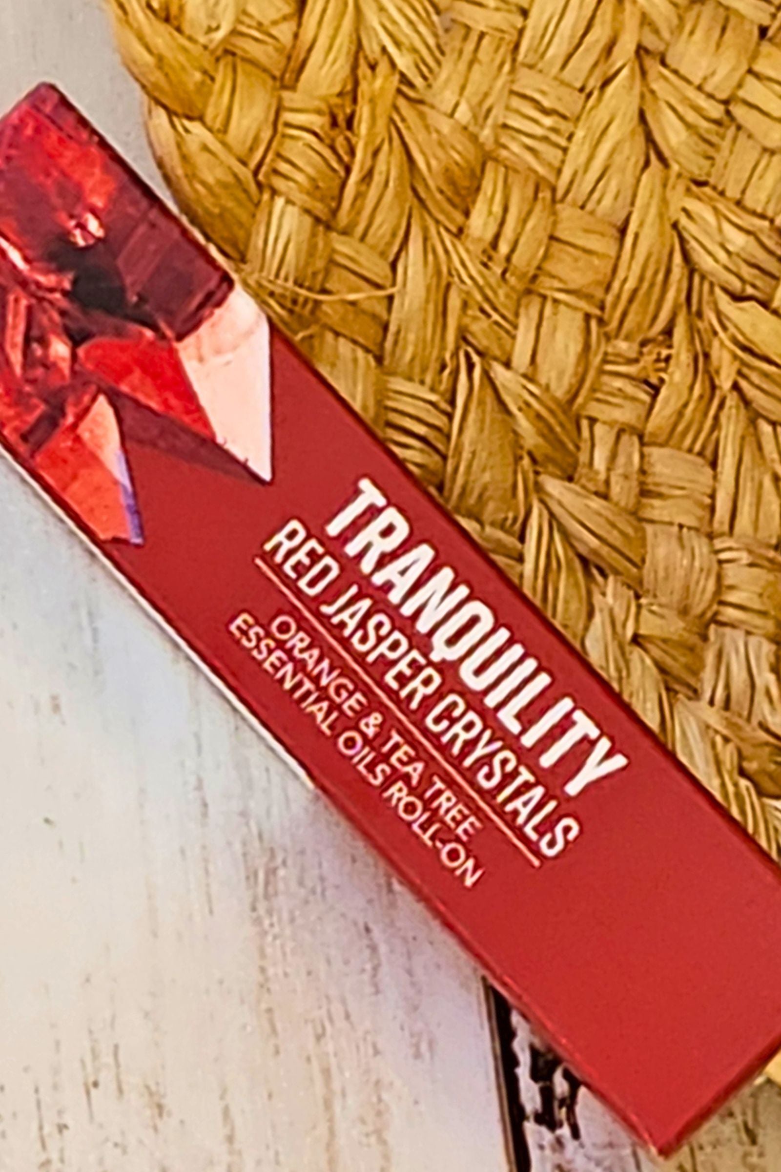 Tranquility: Red Jasper Crystal Orange & Tea Tree Roll-On Essential Oil