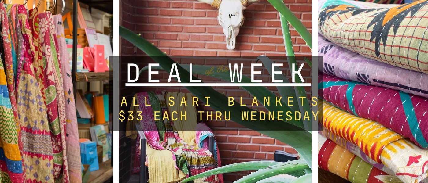 Promotional banner for 'Deal Week' with colorful saris and blankets on a brick wall background.