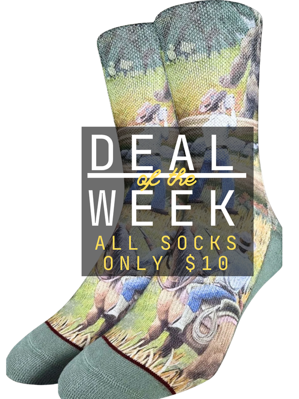 A pair of crew socks with a detailed western-themed print of a cowboy riding a horse, featuring a muted sage green toe and heel, shown on a white background with a 'DEAL of the WEEK' promotional overlay.
