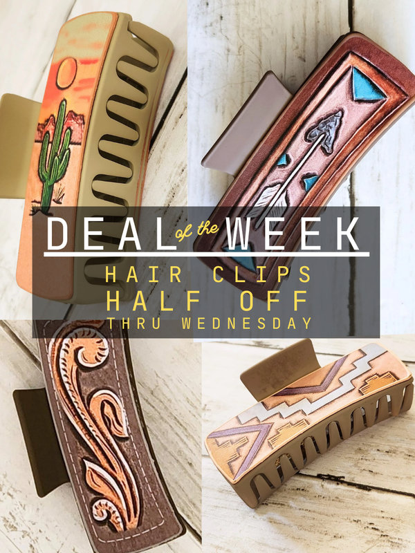 Four western-style hair clips arranged on a whitewashed wood background with a large promotional text overlay reading 'DEAL of the WEEK HAIR CLIPS HALF OFF THRU WEDNESDAY'. The clips feature tan, brown, copper, and pink decorative patterns.