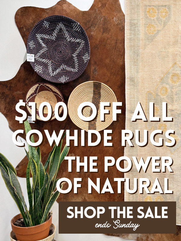 Cowhide rugs with promotional text overlay on a white background