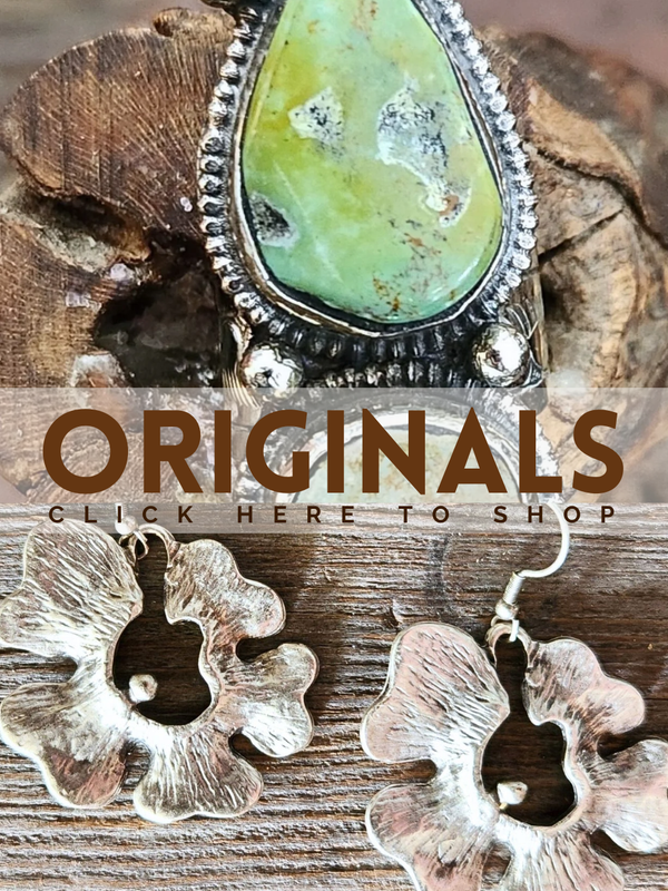 Jewelry with a green stone and silver accents on a wooden surface, with text 'ORIGINALS CLICK HERE TO SHOP'.